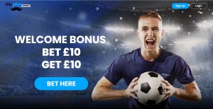 Promo banner with a cheering soccer player holding a ball in a stadium; headline reads 'WELCOME BONUS BET £10 GET £10' and a blue 'BET HERE' CTA.
